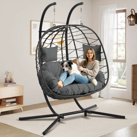 Woman sitting with dog in Double Egg Chair With Stand For Indoor Or Outdoor Use, Two Person Hanging Swing, Grey Cushions
