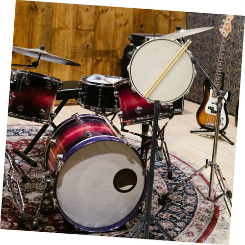 Hella Sturdy 12 Fold Snare Drum Stand Rack With Heavy Duty Accessory Holder For Practice Pads And Gear Compact Road Ready Top Shelf Black Finish in a drum setup.
