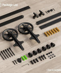 7.5Ft Heavy Duty Sliding Barn Door Hardware Kit components on wood floor, including big spoke wheel hanger and cross style nylon wheels.