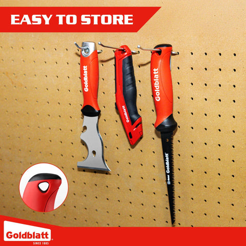 Goldblatt drywall tools: three red-handled jab, keyhole, and hand saws hanging on pegboard.