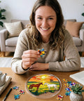 Woman assembling Unique Branches Of Love Acrylic Catcher Puzzle Kit for Doors Garden and Window Hanging with butterfly piece.