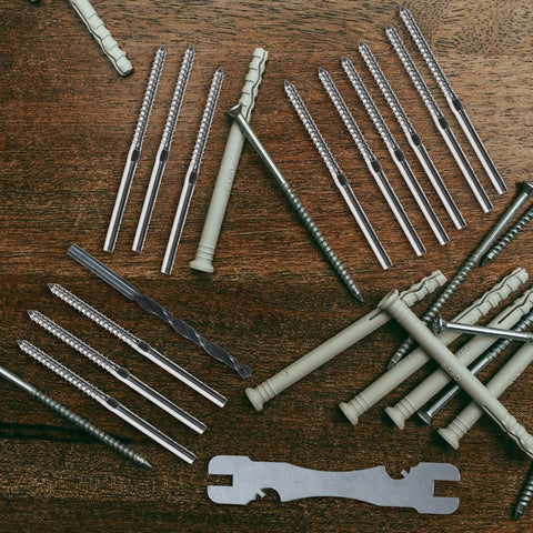 20 Pcs Stainless Steel Lag Screws Left And Right Handed For Cable Railing And Deck Post Hardware, displayed on a wooden surface.