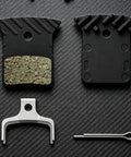 Road Bike Disc Brake Pads Kit With Spring And Pin For Consistent Stopping On Road Rides Resin And Metal Construction With Stainless Steel Support Durable Spares For Daily Rides And Routine Maintenance, two pads and pin