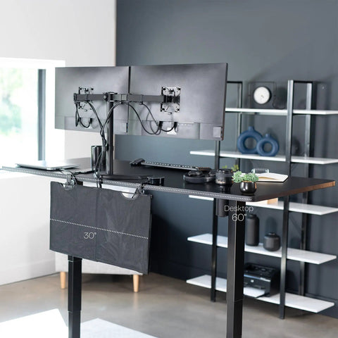 30 Inch Clamp On Desk Skirt With Privacy Panel And Cable Management System in black, attached under a standing desk, cords tucked away