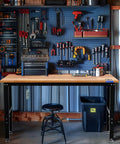 Adjustable Garage Workbench With Rubber Wood Top Heavy Duty Steel Frame Five Height Settings From About Thirty To About Thirty Eight Inches Built In Power Outlets Leveling Feet 1500 Lb Load Capacity For Your Home Workshop in a garage setting with tools.