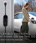 Woman using Easy Plug In Level 1 Portable EV Charger For Tesla 120V 15A With 16 Ft Cord, NEMA 5-15, WiFi Enabled, outdoors