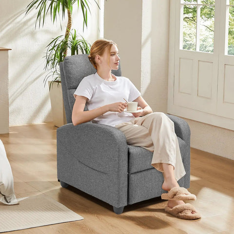 Woman sitting on Ultra Comfy Massage Recliner Chair For Adults With Adjustable 90 to 160 Degree Recline Dual Foot Extension