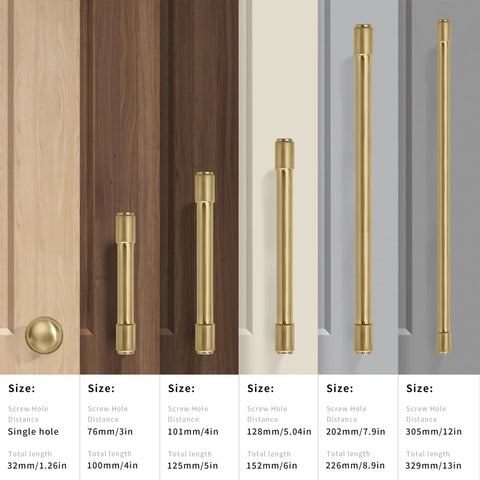 Various sizes of gold-colored cabinet and drawer pulls displayed on doors, showing different lengths and screw hole distances.