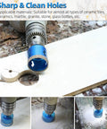 Two And A Quarter Inch Diamond Hole Saw Set With Pilot Bit For Porcelain Tile Ceramic Stone Marble Granite Glass Bottles Heavy Duty Serrated Diamond Tipped Cutting Bits in action on tile.