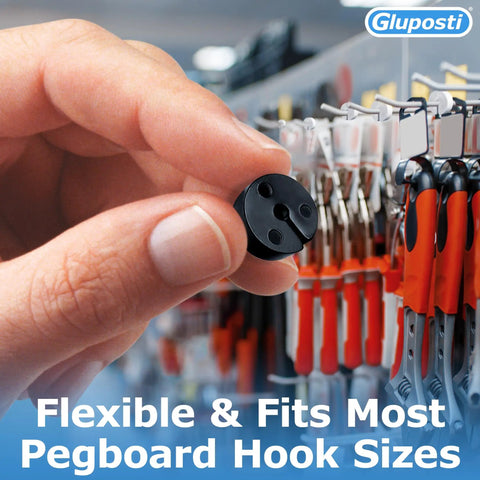 Hand holding Peg Hook Stoppers For 1/4 Inch Pegboard And Slatwall Hooks No Slip Black Round Rubber Clips for inventory control
