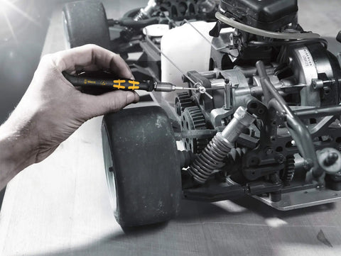 Micro Set ESD Twenty SB Bit Set With Quick Swap Handle 4 Mm Half Moon Or HIOS Drive Compatible Interchangeable Blade System Pro Grade Anti Static Tool Kit in use for mechanical repair.