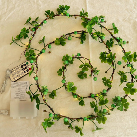 Multicolor Daisy Fairy Lights With Remote Battery Operated 40 LED Daisy String Lights spread on table with remote