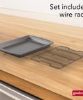 Nonstick 15 X 10.5 Inch Baking Pan with Raised Wire Rack for crispy bacon, chicken and fries, shown on countertop