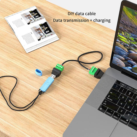 Solderless USB Two Point Zero Connectors DIY Adapter Kit With Plug And Play Screw Terminal Block For USB Cable Type A Converter Pluggable Repair Kit Includes Male And Female Ends For Easy Cable Extension And Quick Fixes connected to a laptop, demonstrating data transmission and charging.