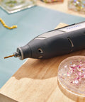 Pro Grade Titanium Coated Rotary Drill Bit Set for Wood Plastics and Soft Metals, 7 Pieces With One Eighth Inch Shank in use