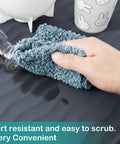 Person wiping spill on Waterproof Silicone Under Sink Mat 31x22 Inch, Heavy Duty Cabinet Liner For Kitchen And Bath, Black