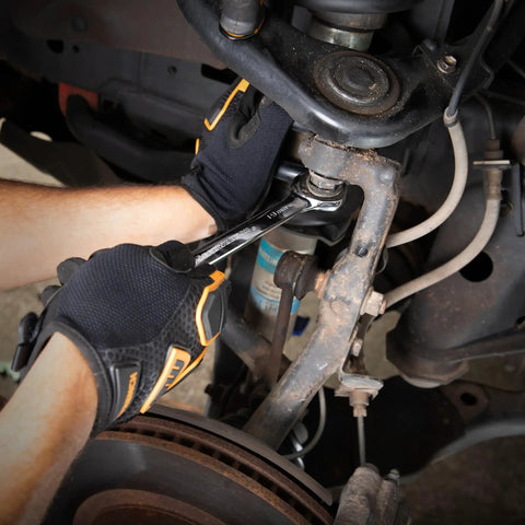 Using 16 Piece Reversible Ratcheting Combination Wrench Set Metric With Flush Mounted Reversing Lever on car suspension