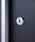 Close-up of lock on 24 Inch Garage Wall Storage Cabinet With Heavy Duty 22 Gauge Steel Wall Mount Design Adjustable Shelf Reversible Door For Tool Storage Cleaning Supplies And Small Gear In Black.