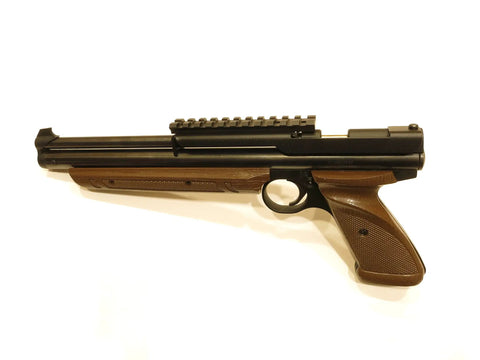 Crosman airgun with all metal firearms grade Picatinny scope mount, showing left side with hardwood grip and mounted rail.