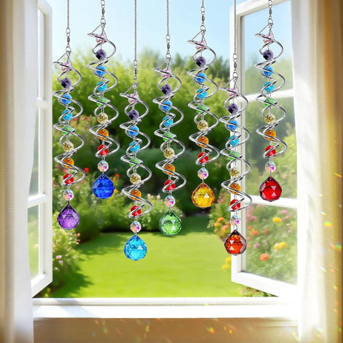 Seven Piece Crystal Gazing Ball Spiral Wind Spinner Suncatchers For Garden Decor, Durable Metal Frame With K9 Crystal Prisms, Cool Colorful Outdoor Yard Ornaments That Catch Sunlight And Spin In The Breeze. Hanging window view of seven spiral crystal wind spinners with colored glass drops