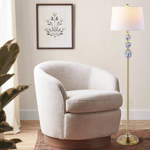 Living room with Bold Brass Gold And Blue Midcentury Ceramic Floor Lamp With Hand Painted Porcelain And White Linen Shade Coastal Classic Style