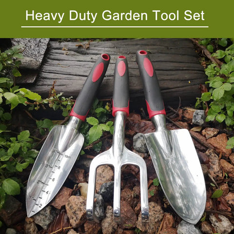 3 Piece Garden Tool Set With Heavy Duty Trowels And Shovels, Aluminum Blades, Non Slip Grip displayed on garden soil