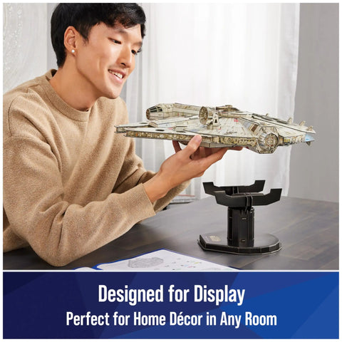 Person displaying Millennium Falcon 3D Model Kit For Star Wars Fans And Collectors, perfect desk decor and dope build puzzle.