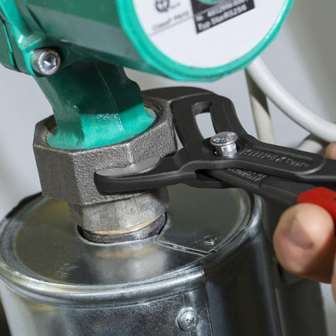 Cobra Water Pump Pliers, 10 Inch, With Adjustable Jaw And Self Locking Grip For Pipes And Nuts, Quick Fine Adjustment in use.