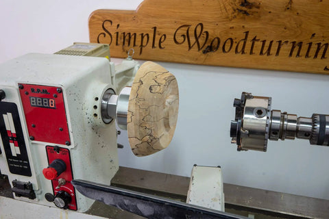 American Made Vacuum Chuck for Woodturning Lathe Bowls, 1 1/4 Inch 8 TPI, 3 1/2 Inch Diameter, displayed on lathe.