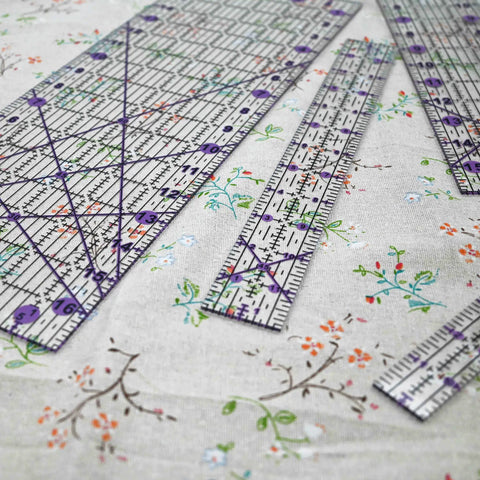 Pro Quilting Ruler Set For Patchwork And Sewing, Acrylic Templates, Precision Cutting Tools In Purple on floral fabric