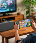 Switch 2 Carrying Case With 24 Game Cartridges Protective Hard Shell Travel Pouch next to person using console on table