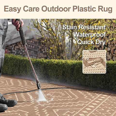 Outdoor Waterproof Plastic Straw Rug 8x10 being cleaned, reversible lightweight carpet for RV camping, beige and brown