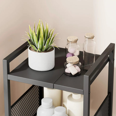 Top view of Expandable 4 Tier Slim Storage Cart on Wheels in Black with plant and jars, adjustable width for narrow spaces