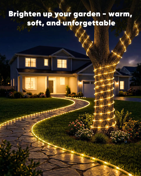 Solar Rope Lights 39Ft 100LED Outdoor String Lights IP65 Waterproof, 8 Lighting Modes, Warm White on garden tree and path