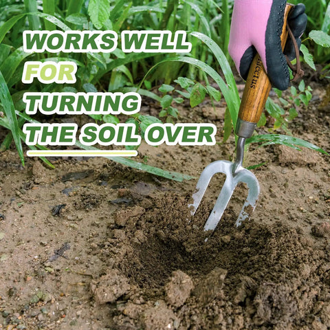 Heavy Duty Weeding Fork With Sharp Tines And Comfortable Wood Handle For Fast Weed Uprooting, shown loosening soil