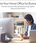 Person working in a home office using 8 Port Gigabit Ethernet Unmanaged Essentials Switch GS308 With No Fuss Plug And Play Setup