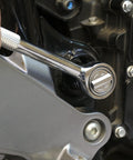 Reversible ratchet from Auto And Motorcycle 51 Piece Tool Kit Set with 6 point socket in use on a motorcycle engine.