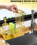 Gold Stainless Steel Kitchen Sink Caddy Organizer With Auto Drain Sponge Holder And Brush Stand Rustproof Countertop Soap Dispenser Rack with removable brush holder.