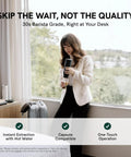 Person using Nano Portable Espresso Maker For Travel And Camping Self Heating With USB C Car Coffee Maker by window