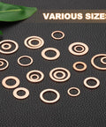 Top Shelf High Grade Copper Crush Washers Assortment Kit Giving Badass Sealing Power And Slick Precision Fitment, various sizes on dark background.