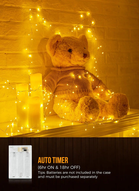Battery Operated Fairy Lights 10Ft 120 LED Firecracker String Lights With 6 Hour Timer illuminating a teddy bear display