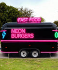 Commercial Grade Coffee Trailer And Mobile Hot Dog Cart Featuring Chef Ready Full Kitchen Setup With Plug And Play Wiring To Help You Crush Sales At Street Events, black food trailer with neon signs.