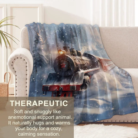 Cozy As Heck Winter Train Blanket with a vintage steam locomotive and snowy forest design on a sofa, flannel material, 80x60 inches.