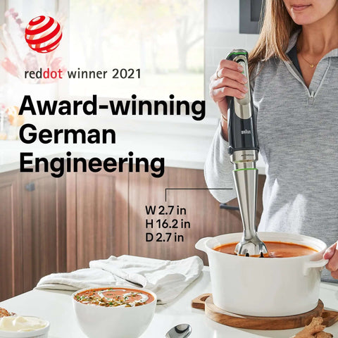 Badass Eight Attachment Hand Blender With Slick Smart Speed Controls And Instant Pulse Mode For No Fuss Vegetable Pureeing Herb Chopping And Creamy Soup Making In Your Home Kitchen in use, blending soup in a pot.