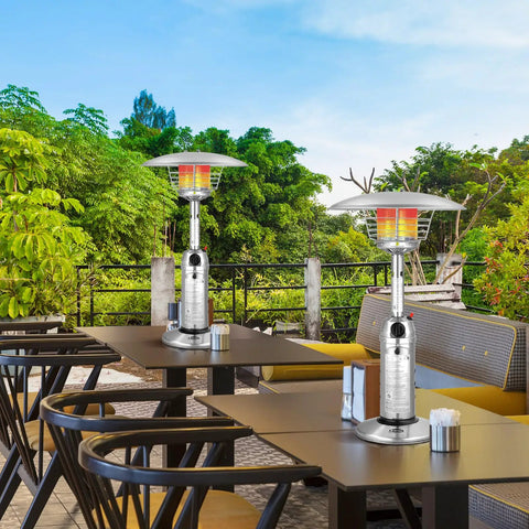Outdoor Propane Patio Heater 11,000 BTU Portable Tabletop With Weighted Base Stainless Steel on restaurant patio.