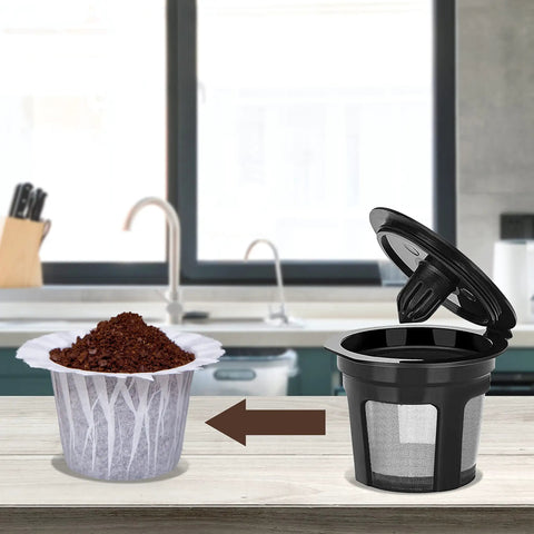 Disposable Coffee Filters 600 Count for Keurig Single Serve Pods displayed with reusable K-Cup on kitchen counter.