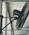Heavy Duty Boat Dock Fan Mount For Four Inch Square Posts Featuring No Sweat Easy Installation with a sturdy aluminum bracket holding a large fan.