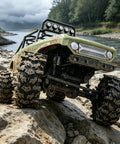Batwing Tread 58mm 1.0 Inch RC Crawler Tires 4 Pack For TRX4M SCX24 AX24 on rocks by river in natural setting