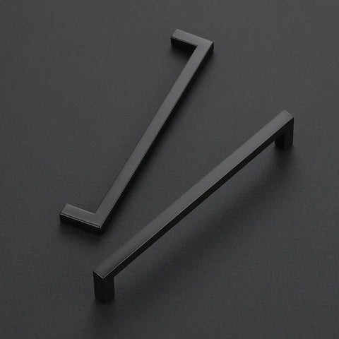 Close-up of two 30 Pack Matte Black Square Drawer Handles Built To Last, Center To Center 6.25 Inch, Zinc Construction, on black background