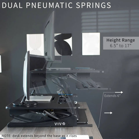 36 Inch Height Adjustable Desk Converter Sit To Stand Riser With Dual Monitor Support side view showing height adjustment